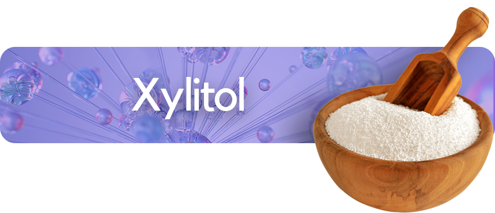 Xylitol ingredient shown as white crystalline powder used in oral care formulations
